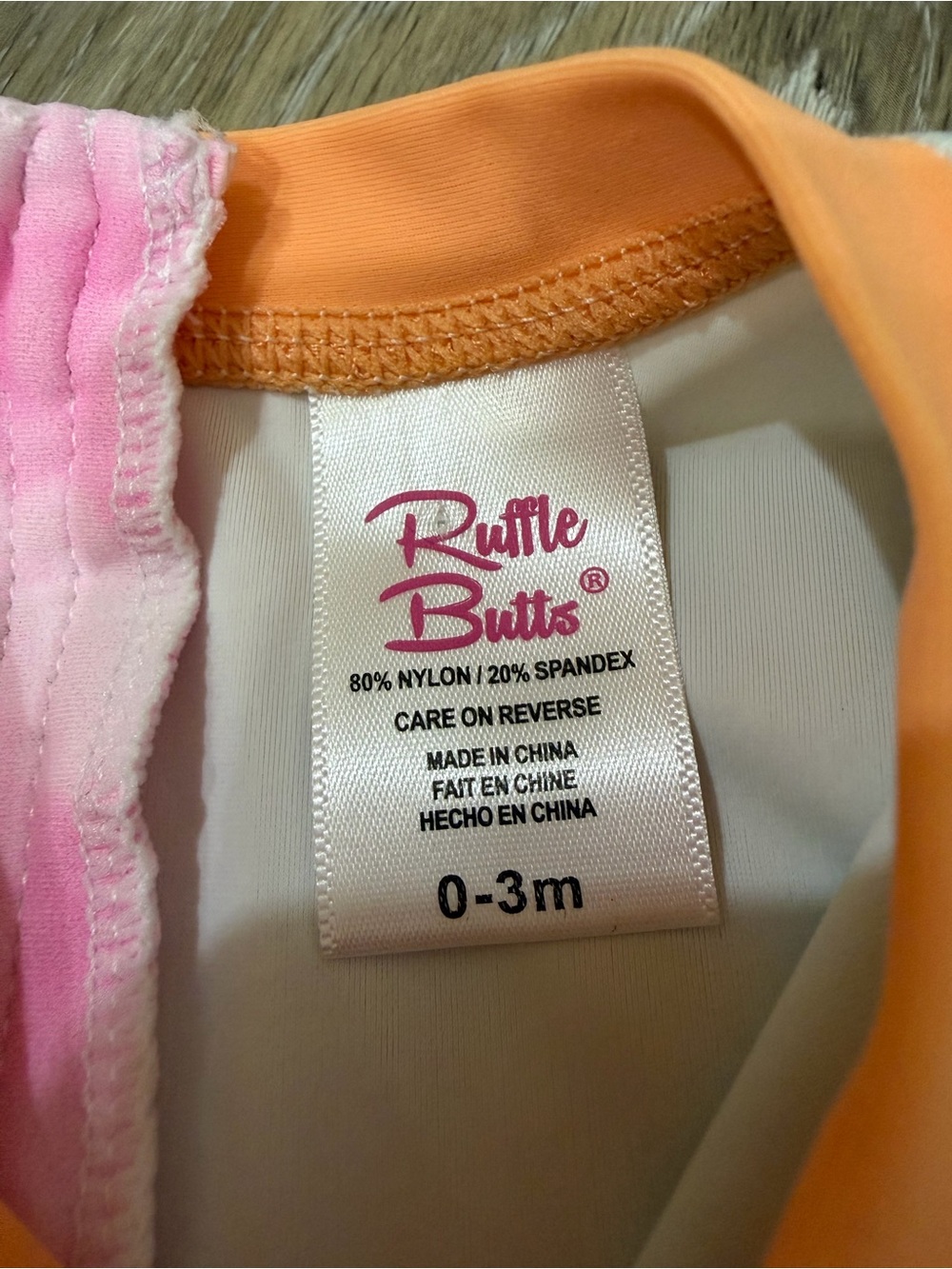 Ruffle Butts Pink & Orange Tie-Dye Baby Long Sleeve One-Piece Swim Suit - Picture 6 of 7